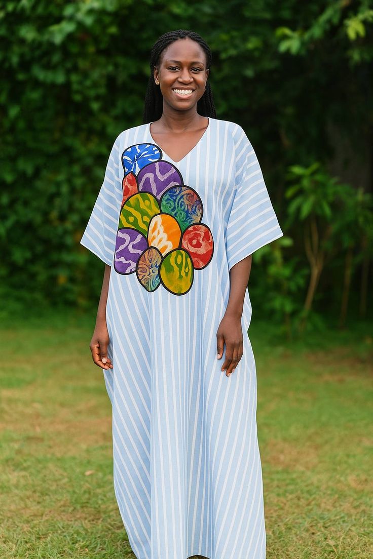 Boubou Africain à rayure avec patches en motifs de pagne adiré.