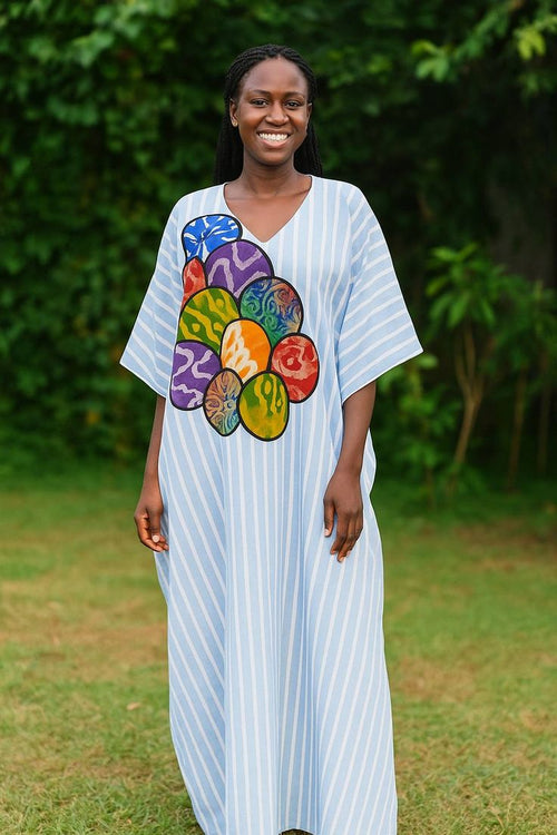Boubou Africain à rayure avec patches en motifs de pagne adiré.